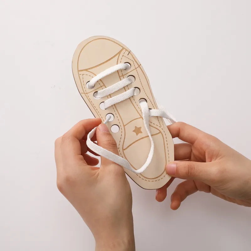 Montessori - aprendendo a passar e amarrar o cadarço do sapato