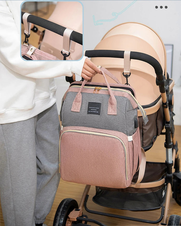 Mala maternidade - Bolsa compacta que vira mini berço portátil com vários bolsos e divisórias.